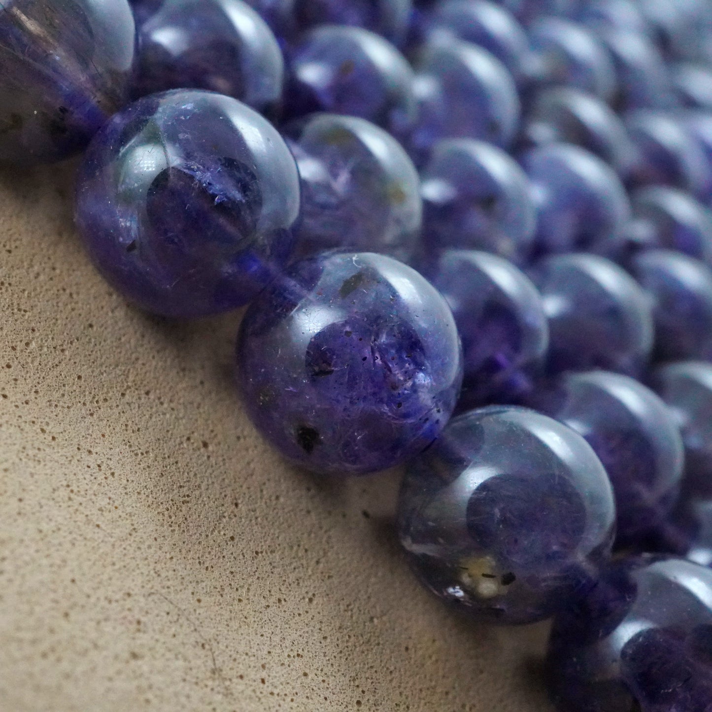 Iolite (Round)(Smooth)(6mm)(8mm)(10mm)(16"Strand)