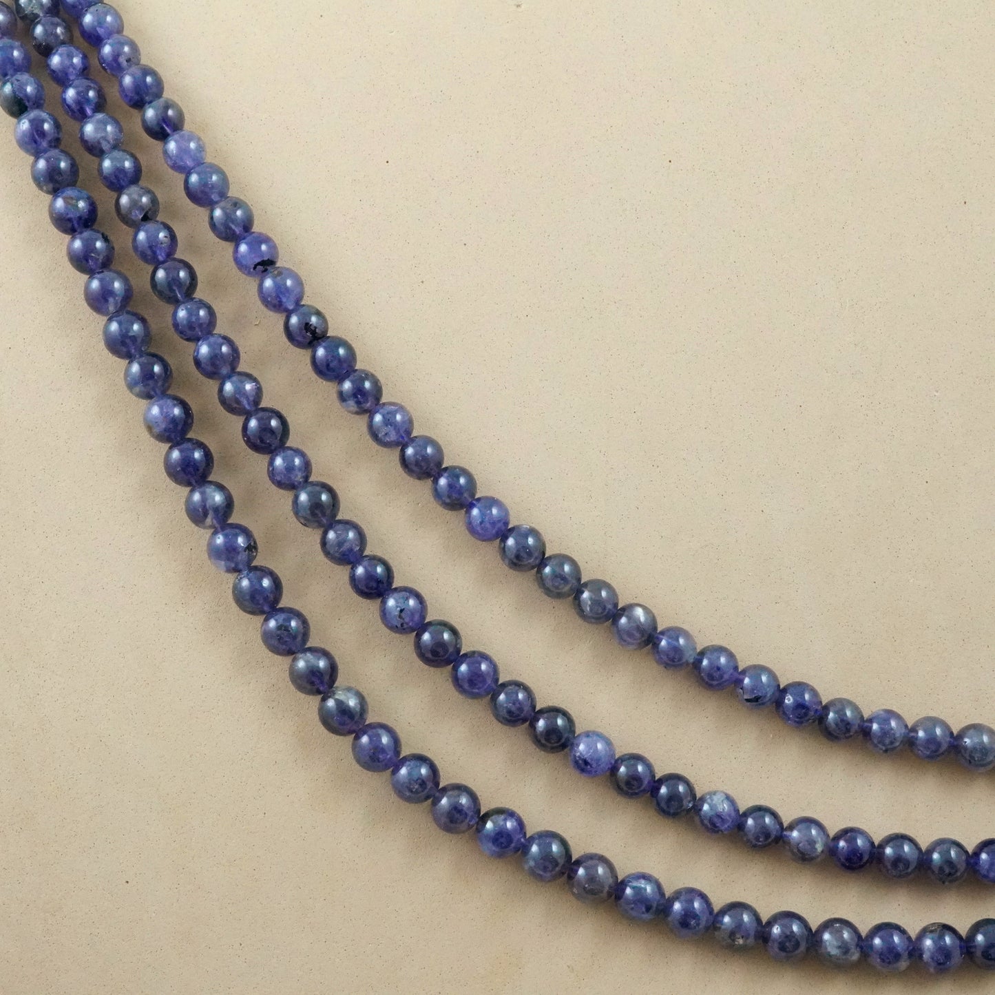 Iolite (Round)(Smooth)(6mm)(8mm)(10mm)(16"Strand)