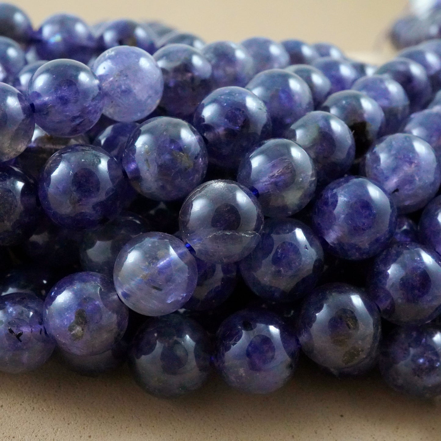 Iolite (Round)(Smooth)(6mm)(8mm)(10mm)(16"Strand)