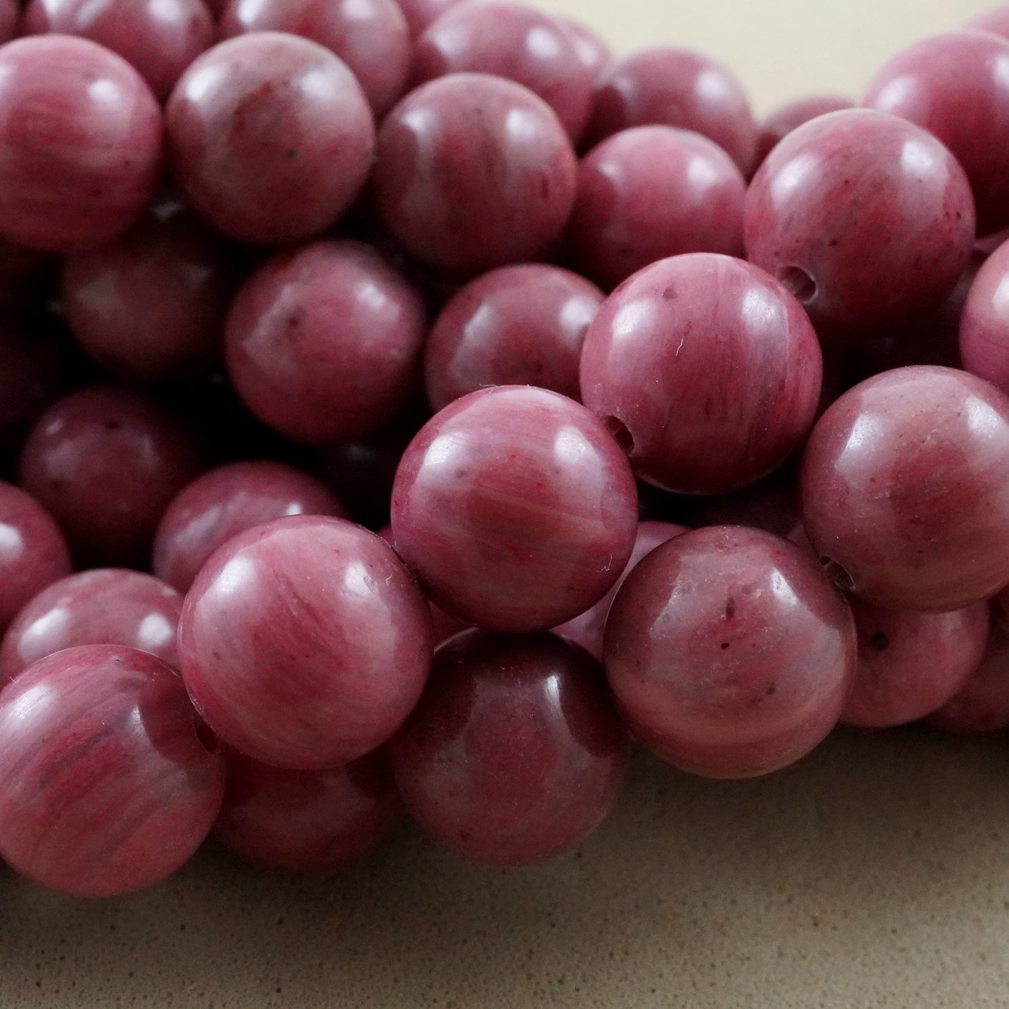 Thulite (Round)(Smooth)(4mm)(6mm)(8mm)(10mm)(12mm)(16"Strand)