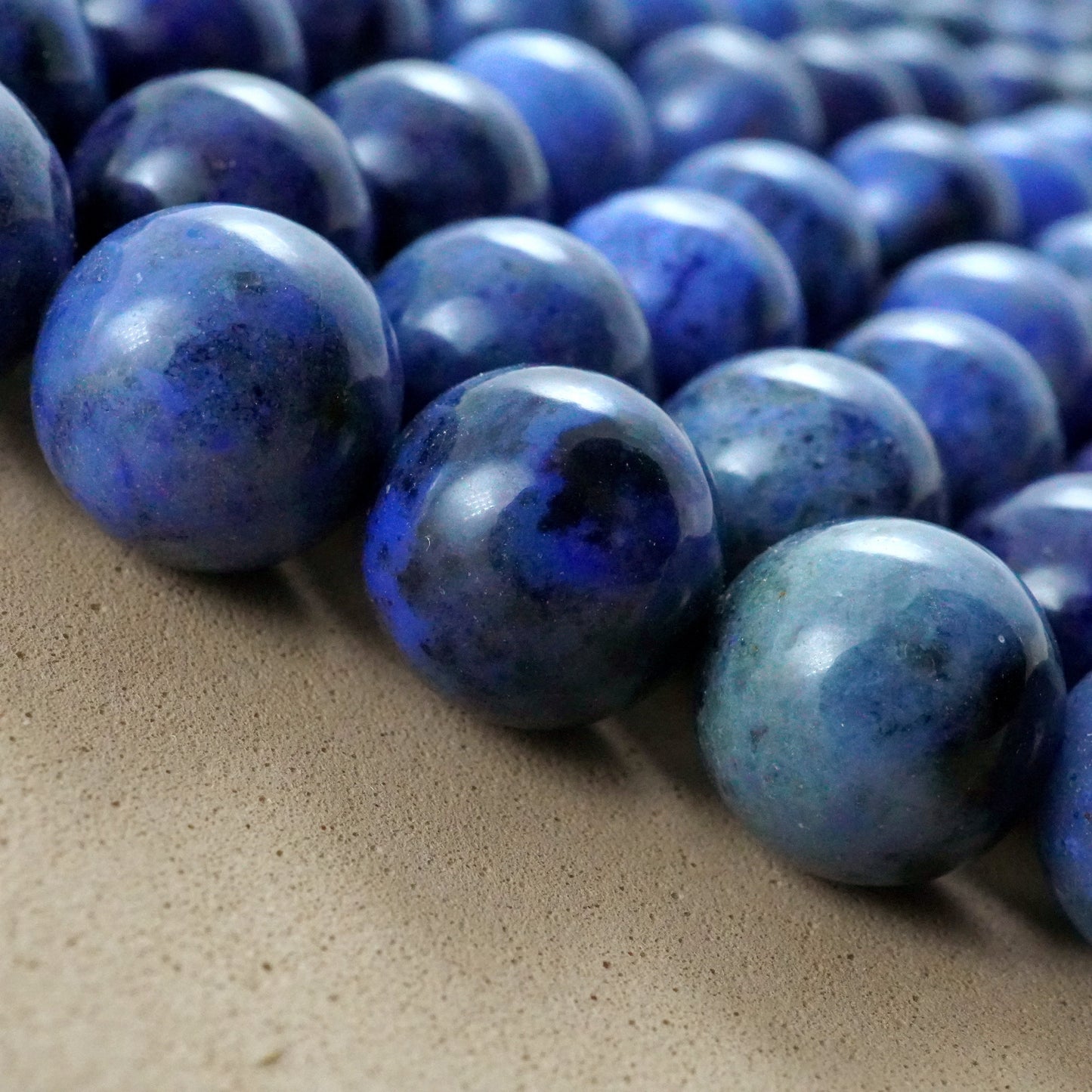 Dumortierite (Round)(Smooth)(4mm)(6mm)(8mm)(10mm)(16"Strand)