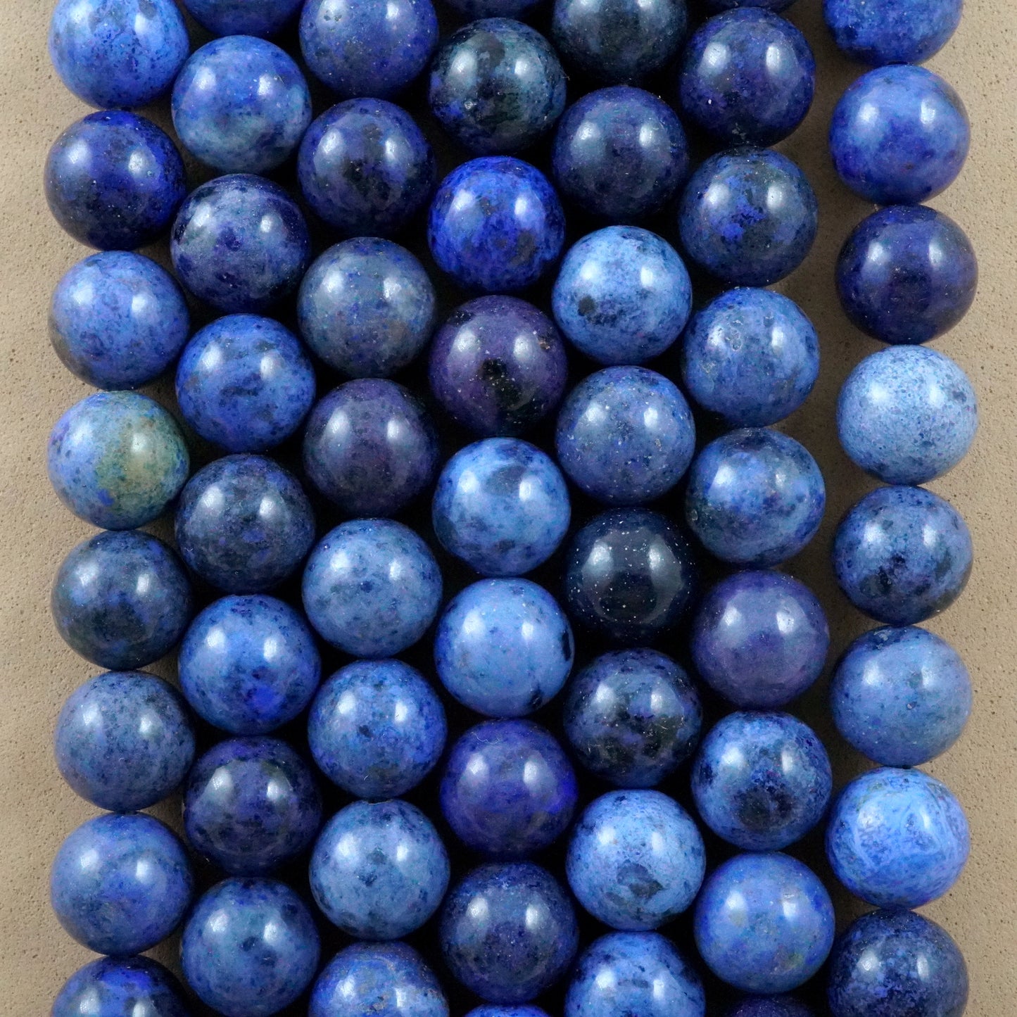 Dumortierite (Round)(Smooth)(4mm)(6mm)(8mm)(10mm)(16"Strand)