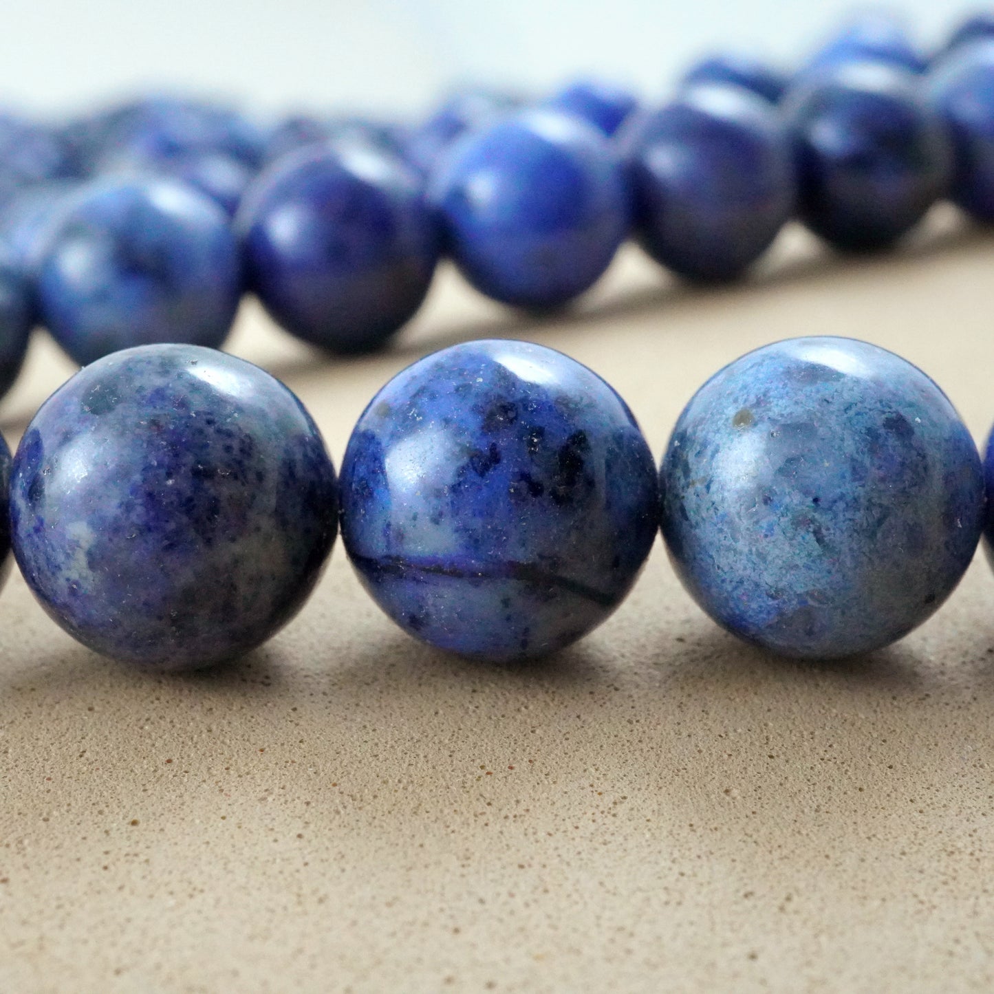 Dumortierite (Round)(Smooth)(4mm)(6mm)(8mm)(10mm)(16"Strand)