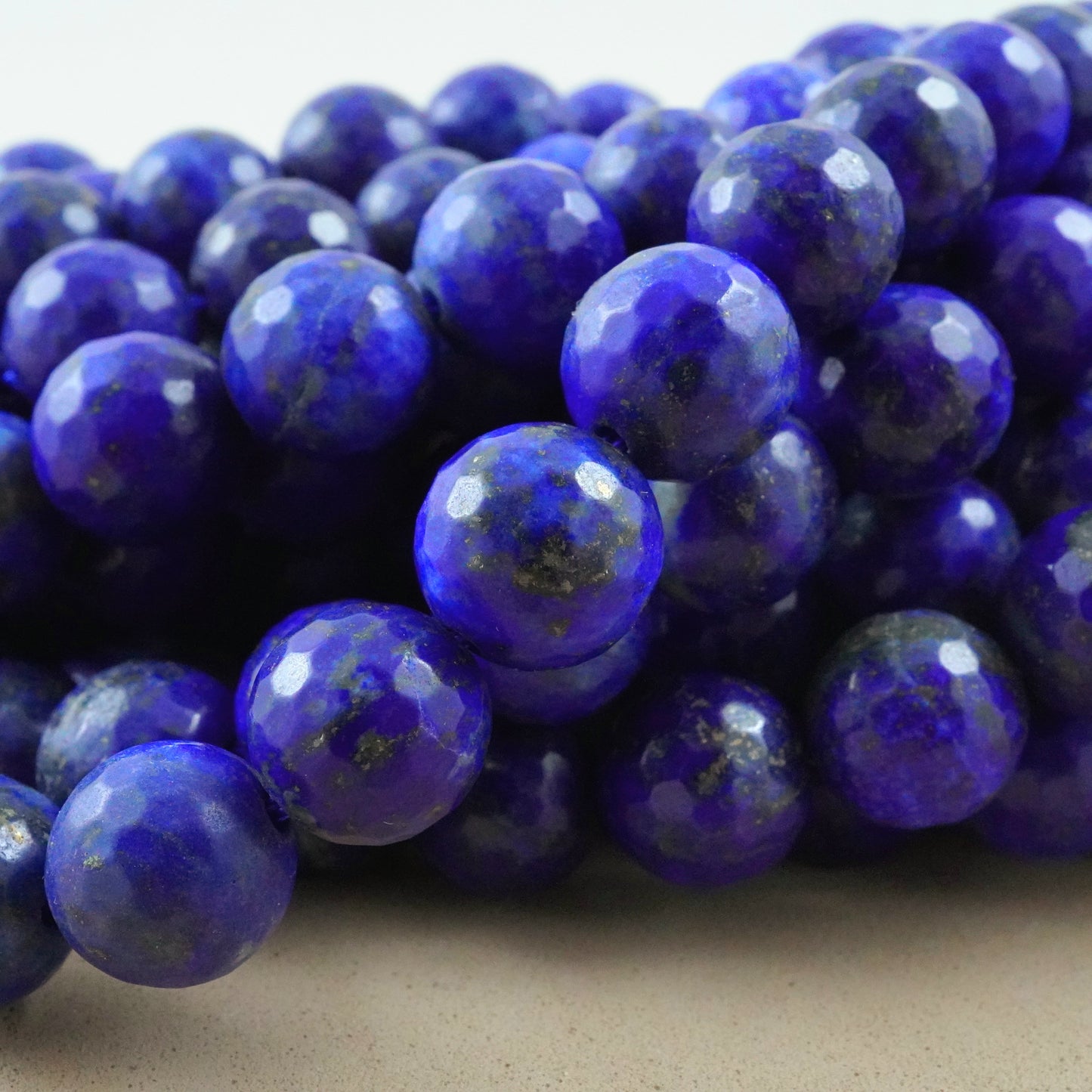 Lapis Lazuli (Round)(Faceted)(4mm)(6mm)(8mm)(10mm)(12mm)(16"Strand)