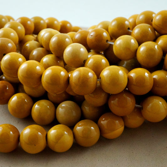 Yellow Mookaite (Round)(Smooth)(4mm)(6mm)(8mm)(10mm)(16"Strand)